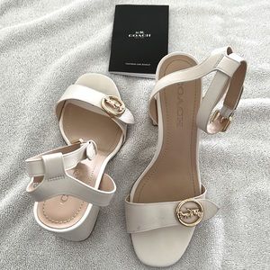 You are looking a pair of woman’s coach heels size 8 USA